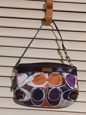 Coach Wristlet with Orange, Purple,Black & Brown Accents